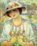 Молодая женщина в шляпе с цветами